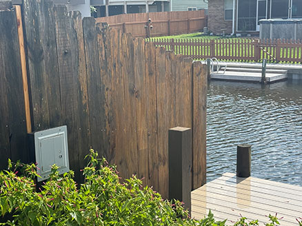 Polynesian Isles, Gulf Breeze — waterfront wood fence