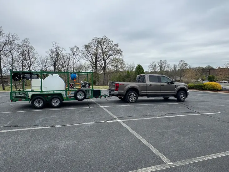Industrial-grade pressure washing trailer and equipment used by Leprechaun Pro Wash in Gulf Breeze Florida