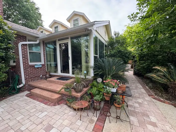pensacola-brick-home-paver-patio-sunroom