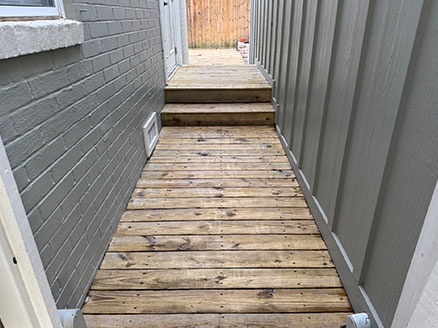 Pensacola side-yard deck walkway Deck Cleaning After